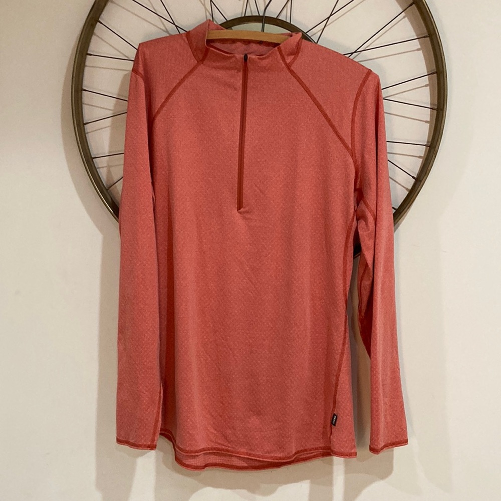 Orange long sleeve top. In great condition!